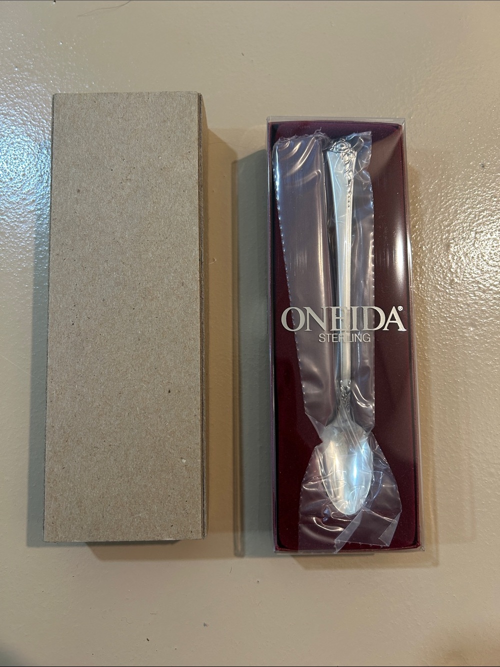 Oneida heirloom Sterling silver spoon new in box